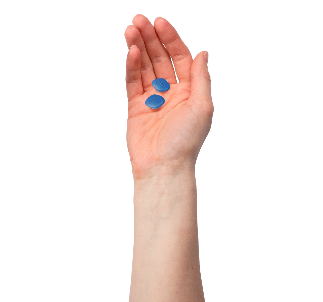 hand holding blue Viagra® pill